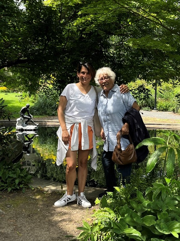 2 women with arms around each other