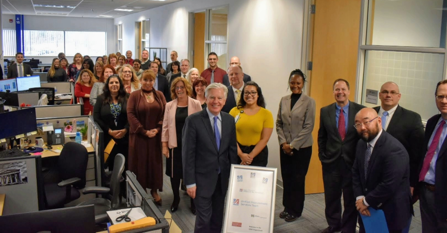 A group photo of the UPST team with President Marty Meehan