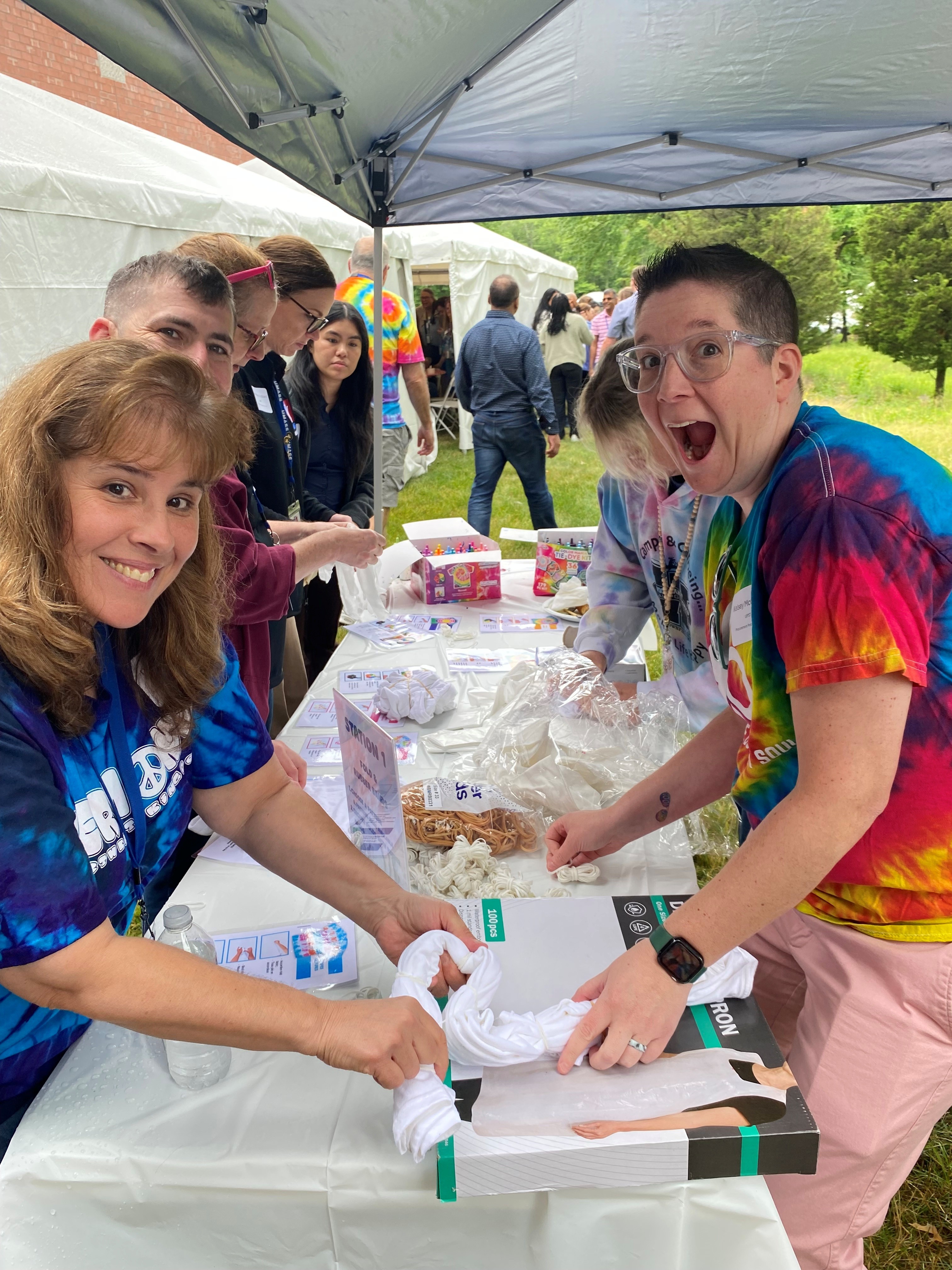 Deb, Colin, Kelsey enjoying the tye dye station