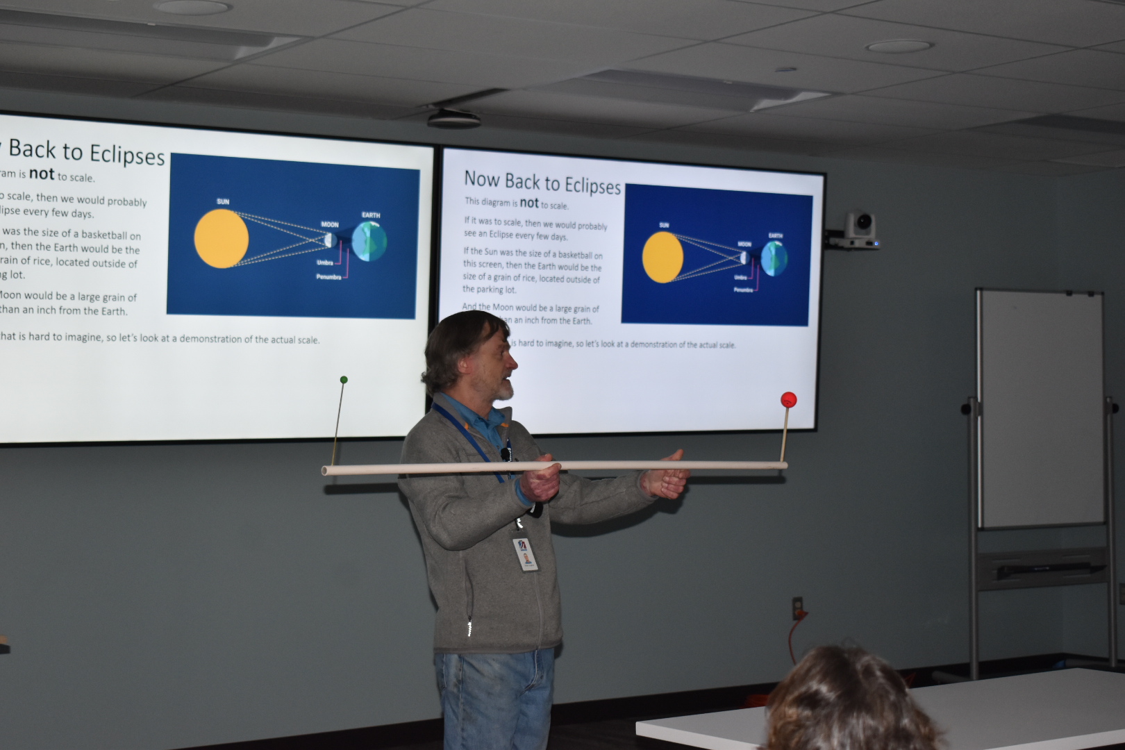Peter Hughes demonstrating a solar eclipse