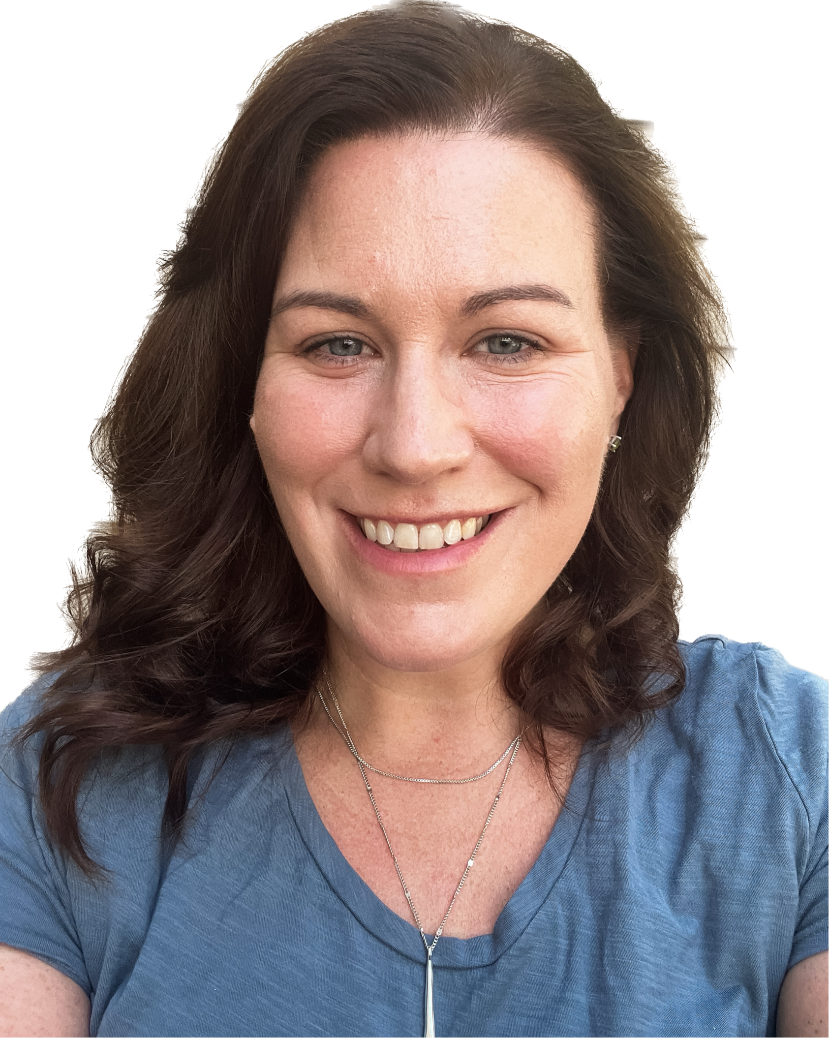 a light skinned women with long brown hair smiles