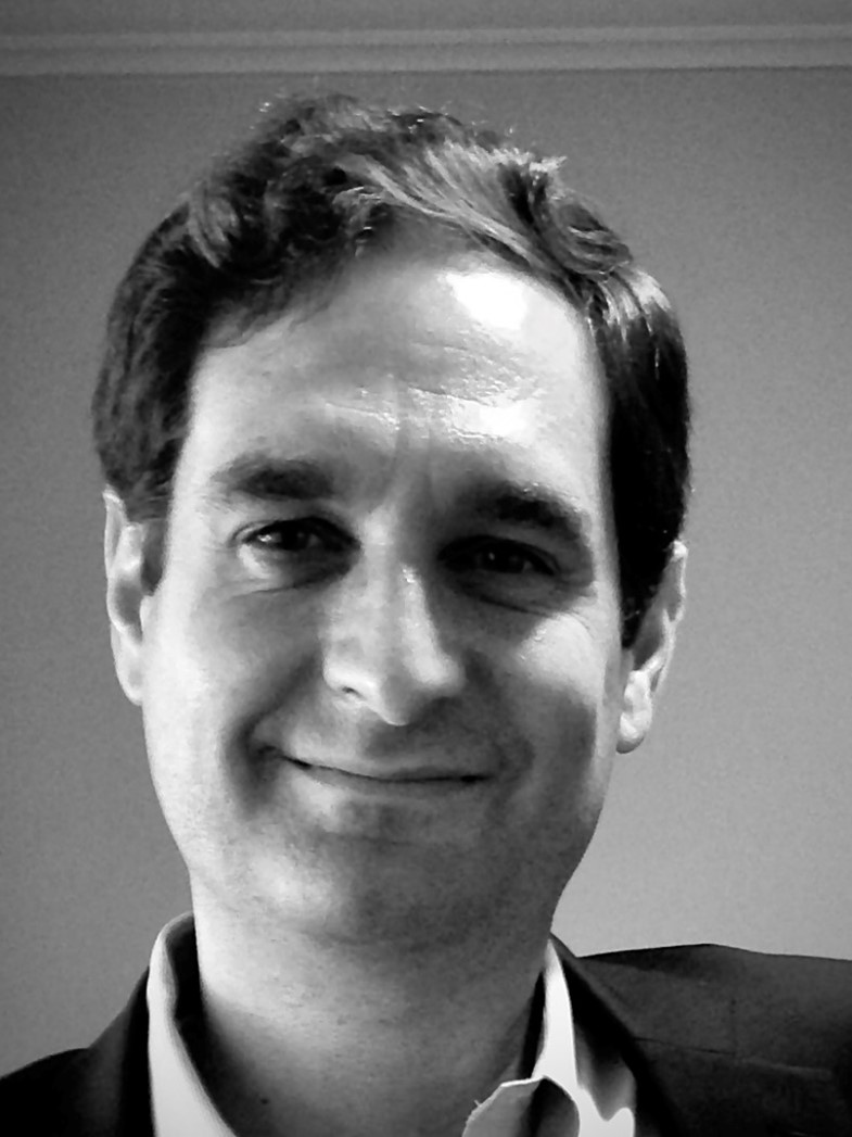 black and white photo of male smiling