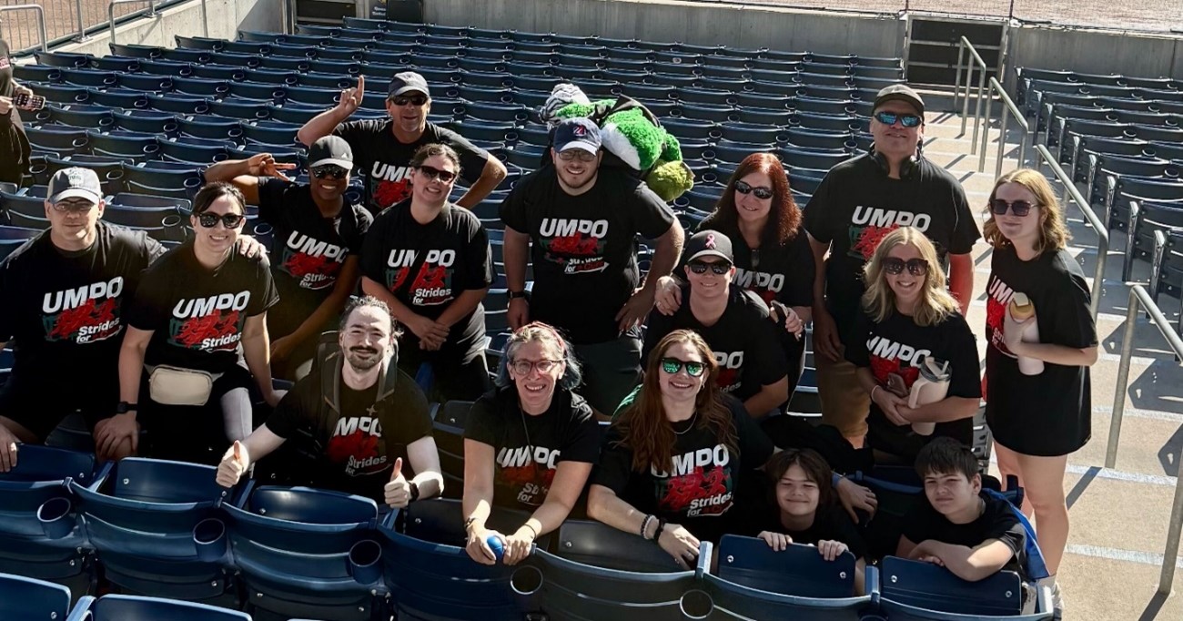 Members of the UMPO Strides for a Cure team pose for a picture at Polar Park