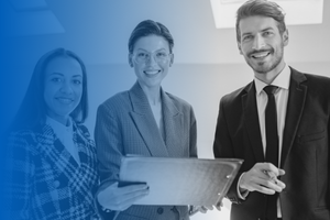 Three individuals dressed professionally smiling at camera while the person in the center holds a large portfolio