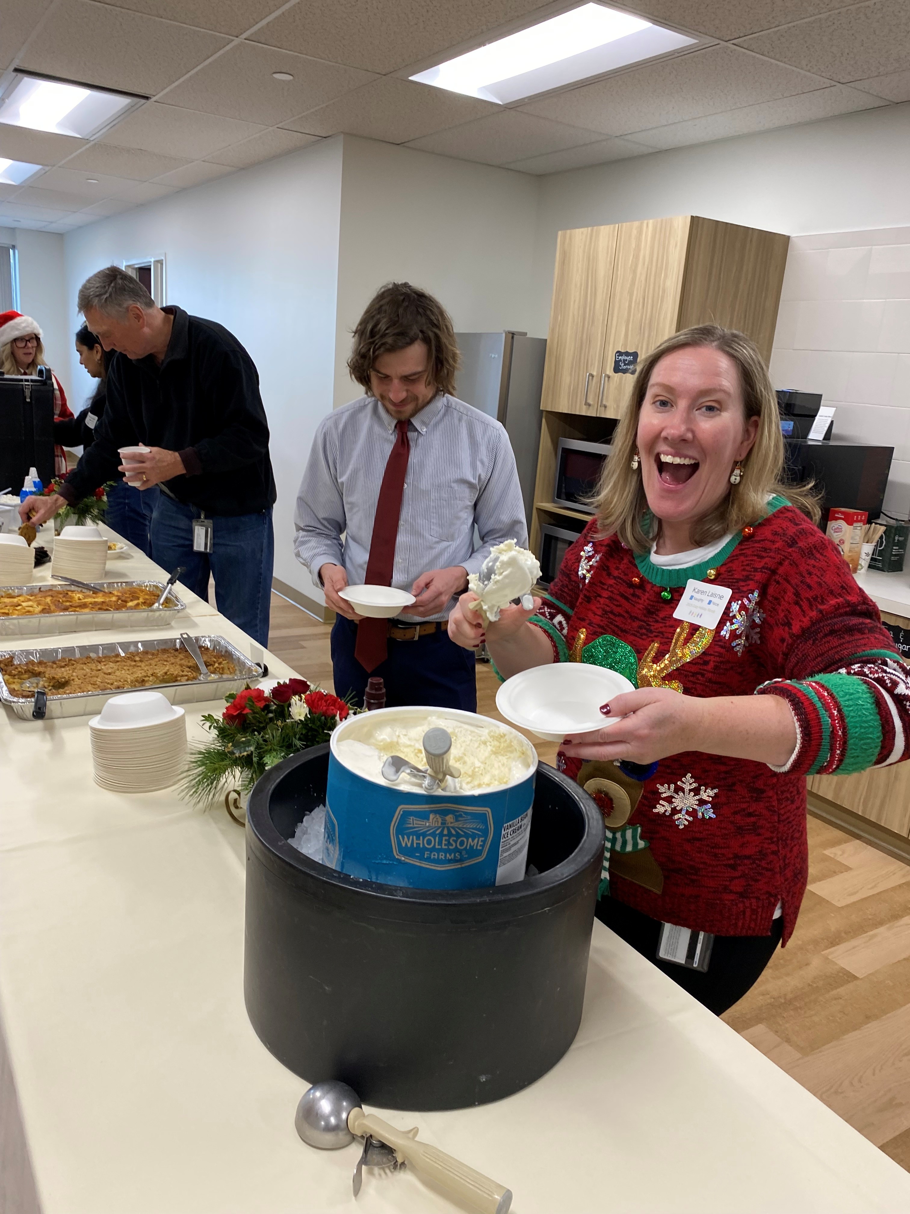 A man and woman getting ice cream smiling
