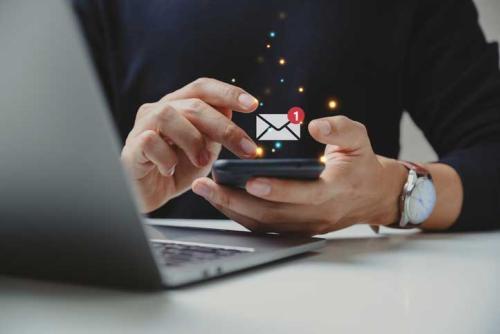 Person accessing email on phone