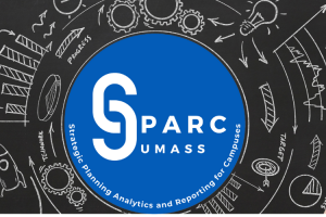 Hand holding a laptop with an overlay of icons and the word update