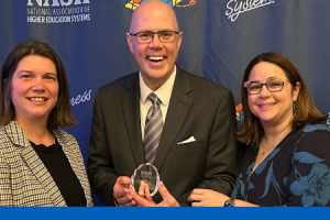 Picture shows Associate Vice President LeeAnn Pasquini (left) Chief Procurement Officer Michael Durkin (center) and and NASH Interim President Jessica Todtman (right)