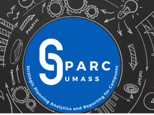 Hand holding a laptop with an overlay of icons and the word update