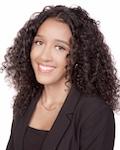 Student Trustee Felicity Oliveira in a black blazer over a black shirt