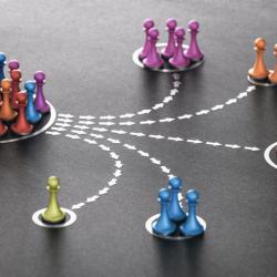 Group of pawns segmented into smaller groups to symbolize email marketing segmentation